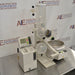 Angled perspective view of Buchi R-100 rotary evaporator system showing glass condenser assembly, receiving flask, heating bath, and digital controller module