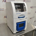 Left angled perspective view of Cole-Parmer Geno Grinder 2010 tissue homogenizer showing windowed lid chamber and front digital control screen