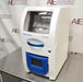 Right angled perspective view of Cole-Parmer Geno Grinder 2010 tissue homogenizer showing windowed lid chamber and front digital control screen