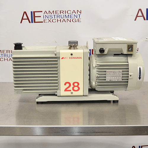 Front product view of an Edwards E2M28 rotary vane vacuum pump, featuring its gray finned housing, prominent red model number label, and attached electric motor unit