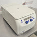 Three-quarter angle product view of an Eppendorf 5427R refrigerated microcentrifuge, highlighting the cooling vent side louvers, curved housing lid, and digital front control interface on a stainless steel surface