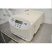 Left angled perspective view of Eppendorf 5430 R refrigerated benchtop centrifuge with closed lid on stainless steel table featuring keypad control panel