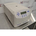 Right angled perspective view of Eppendorf 5430 R refrigerated benchtop centrifuge with closed lid on stainless steel table featuring keypad control panel