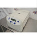 Left angled perspective view of Eppendorf 5430 R refrigerated microcentrifuge with closed lid on stainless steel table showing front digital control panel