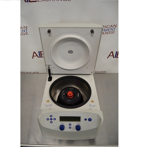 Top-down front perspective view of Eppendorf 5430 R refrigerated microcentrifuge with open lid showing installed fixed-angle rotor and digital control panel