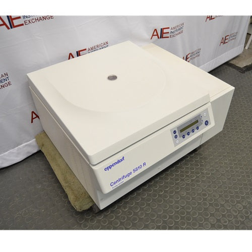 High-angle view of an Eppendorf 5810 R refrigerated benchtop centrifuge with lid closed showing front control panel display and side extension