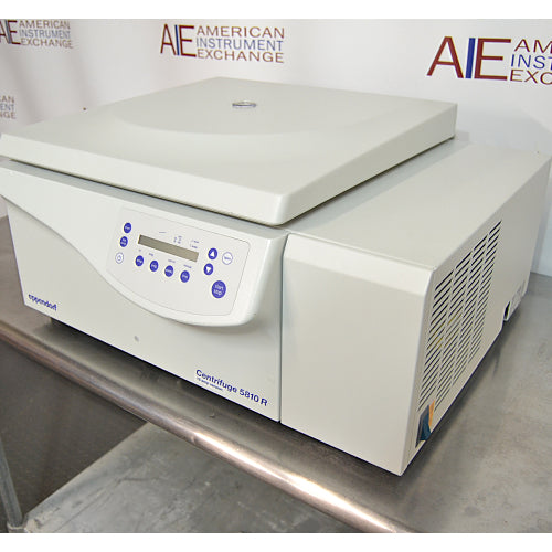 Right three-quarter angle view of an Eppendorf 5810R refrigerated benchtop centrifuge, showing its off-white cabinet, digital interface panel, closed centrifuge lid, and side-mounted refrigeration compressor housing with ventilation louvers