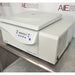 Right three-quarter angle view of an Eppendorf 5810R refrigerated benchtop centrifuge, showing its off-white cabinet, digital interface panel, closed centrifuge lid, and side-mounted refrigeration compressor housing with ventilation louvers