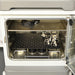 Interior product view of an Eppendorf New Brunswick S41i CO2 incubator with integrated shaker, showcasing the stainless steel chamber, upper perforated shelf, internal shaker platform with flask clamps, and water pans