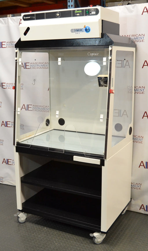 Front angled perspective view of an Erlab Captair XL1044 ductless fume hood on a locking caster stand, highlighting its clear viewing enclosure, top-mounted control panel and filter module, and internal work surface