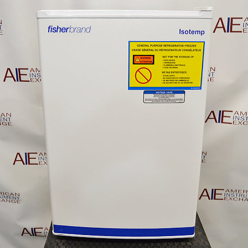 Front eye-level view of a Fisher Scientific Isotemp general purpose undercounter freezer, featuring a white exterior housing, a solid front door with Fisherbrand and Isotemp branding, and a yellow warning label detailing storage restrictions