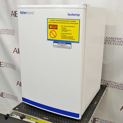 Right angled perspective view of a Fisher Scientific Isotemp general purpose undercounter freezer on a cart, featuring a white cabinet body, solid door with branding, and a yellow warning label