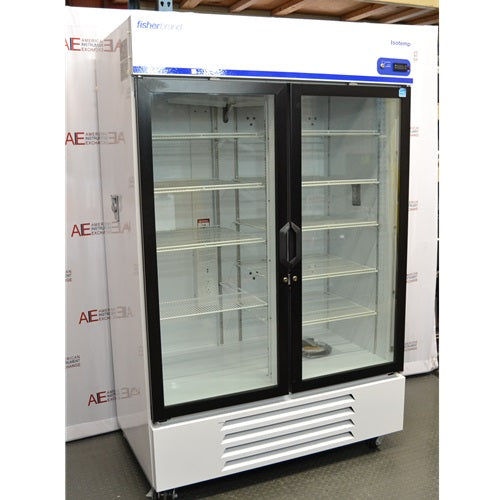 Left angled perspective view of Fisherbrand Isotemp double glass door laboratory refrigerator displaying side panel, glass front doors, digital readout screen, and bottom ventilation panel