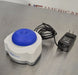 Left angled perspective view of Fisherbrand mini vortex mixer with blue rubber cup, compact housing, and power adapter