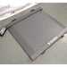 Three-quarter angle product view of a Global Industrial 318506 drum scale with an LCD indicator, highlighting the low-profile diamond plate weighing platform, ramps, and digital display terminal on a floor