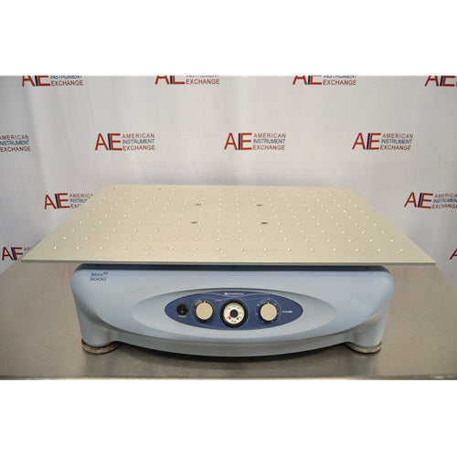 Thermo MaxQ 3000 laboratory shaker featuring a light blue base with a front control dial panel beneath a large flat platform with mounting holes