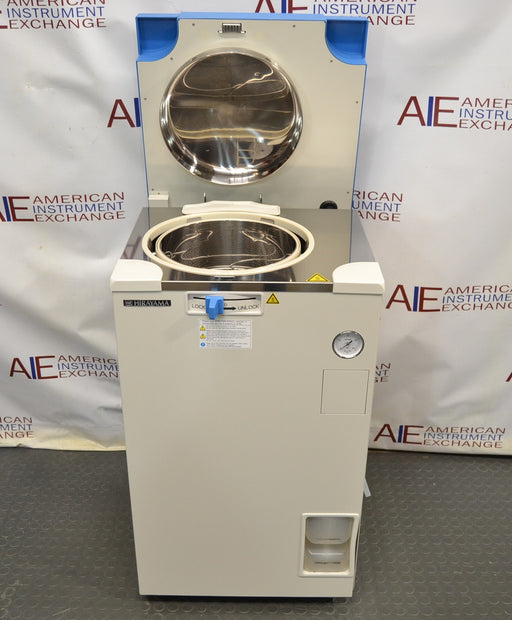 Front eye-level view of a Hirayama HV-50II vertical autoclave demo unit with its top lid open, revealing the stainless steel inner chamber, white cabinet body, blue control lever, pressure gauge, and exhaust bottle compartment