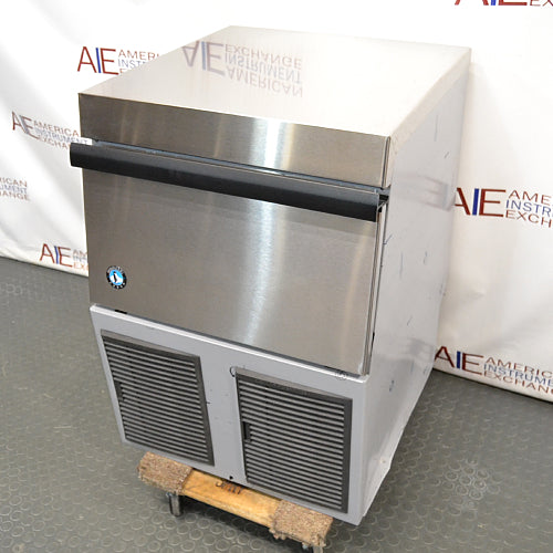 Right three-quarter angle product view of a Hoshizaki F330 BAJ flaker ice maker, highlighting the stainless steel top, front bin door with black handle, and side panels