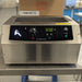 Front eye-level view of a Lab Armor 6L Bead Bath on a stainless steel surface, featuring its stainless steel housing, open bath chamber, and a black front control panel with a temperature dial, digital LED display showing 47.2, indicator lights, and a power switch