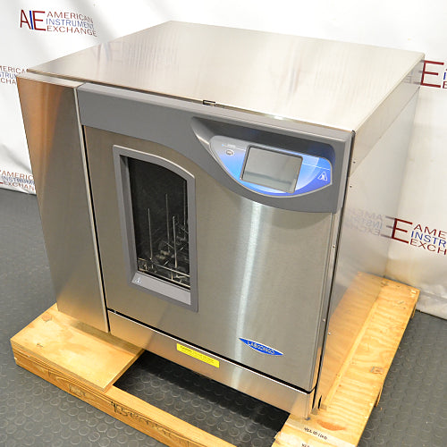 Right three-quarter angle product view of a Labconco FlaskScrubber Vantage 422101010 glassware washer, showcasing its stainless steel body, control panel, and viewing window on a wooden pallet base
