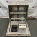 Front eye-level view of a Labconco Freestanding Glassware Washer (Model 4420430) with its door fully open down, revealing dual internal stainless steel wire racks, the central water distribution column, and the interior door panel with built-in detergent and additive compartments