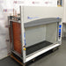 Left angled perspective view of a Labconco Protector Premier laboratory fume hood showcasing its exterior side plumbing panels and caster base