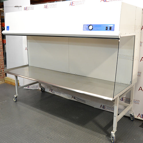 Left angle product view of a Labconco Purifier clean bench, showcasing its stainless steel workspace, clear side panels, mobile caster stand, and top control console