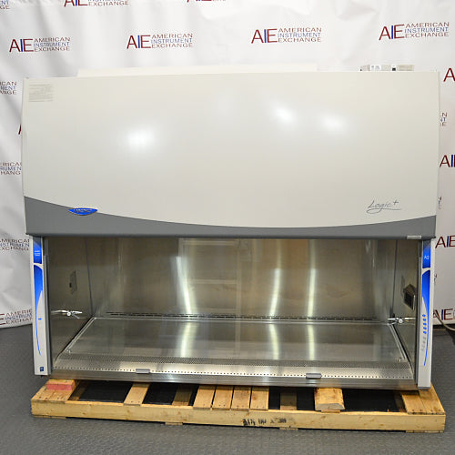 Front product view of a Labconco Purifier Logic+ Type A2 biosafety cabinet, showcasing its stainless steel interior workspace, glass sash frame, and exterior housing on a wooden pallet