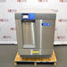 Front view of Labconco SteamScrubber Glassware Washer model 4400420 featuring stainless steel door, blue LCD control panel, and door handle mounted on wooden pallet