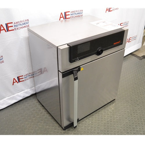 High-angle perspective view of a Memmert Universal Oven UN30 showing its stainless steel cabinet, door handle, and top front control display module