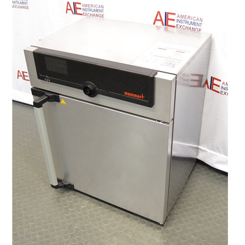 Three-quarter perspective view of a Memmert Universal Oven UN30 showcasing its stainless steel exterior cabinet, door handle, and black control interface screen