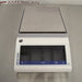 Front eye-level view of a Mettler Toledo MS3002TS precision balance resting on a stainless steel surface featuring a square weighing pan and a digital touchscreen display panel