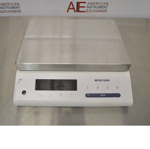 Front view of Mettler Toledo MS32001L A03 precision balance showing large stainless steel weighing pan and digital display control panel