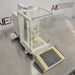 Mettler Toledo XP26DR microbalance ka left angle view, jisme left side weighing housing, glass draft shield, aur detachable touch terminal saaf dikhai de rahe hain.   