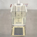 Mettler Toledo XP26DR microbalance ka top angle view, jisme glass draft shield ka upar ka hissa, internal weighing chamber, aur touch screen display terminal saaf dikhai de rahe hain.   