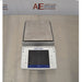 Top view of Mettler Toledo XPE2002S precision balance displaying stainless steel square weighing pan and front touchscreen control terminal