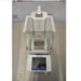 High-angle front view of Mettler Toledo XPE26 microbalance showing top draft shield structure, internal micro-weighing chamber, and touchscreen control unit