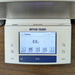 Close-up view of the Mettler Toledo XS16001L digital precision balance control terminal, featuring an active LCD screen showing a zero weight reading and touchscreen menu options, flanked by tactile operational buttons