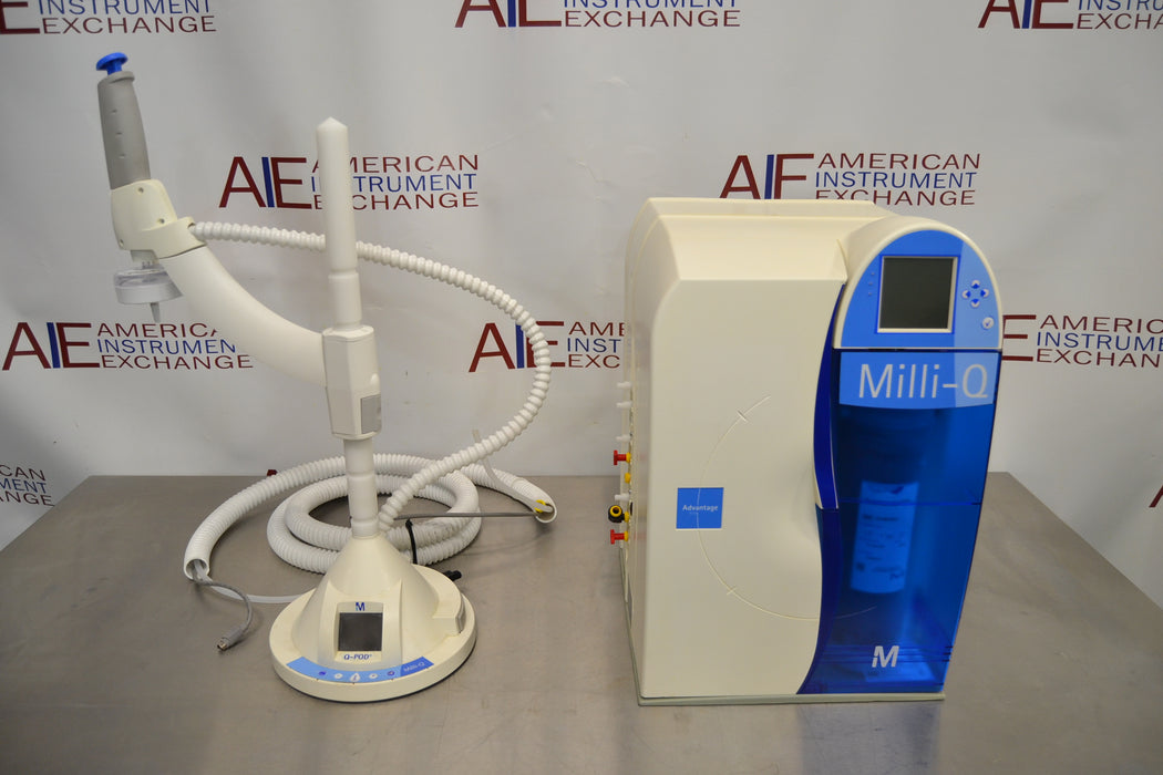 Angled perspective view of a Millipore Milli-Q Integral 15 water purification system showing the main processing unit alongside its linked remote dispensing arm and base control unit on a stainless steel surface