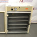 Front view of a Napco E Series 301 incubator with the outer door open, showcasing the inner glass door, multiple perforated interior shelves, and the top control console