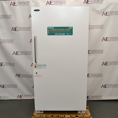Norlake flammable material storage laboratory refrigerator ka front view, jisme solid white insulated door, vertical metal handle, key lock, aur warning label saaf dikhai de rahe hain.