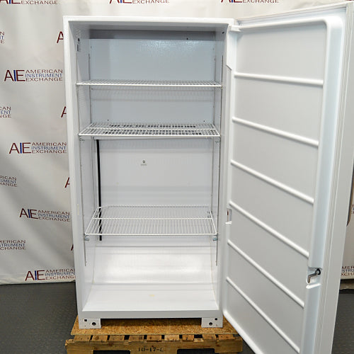 Norlake flammable material storage laboratory refrigerator ka interior view, jisme open door, adjustable wire storage shelves, white interior cabinet lining, aur bottom floor saaf dikhai de rahe hain.