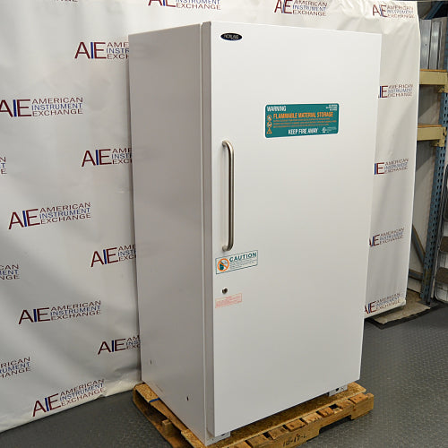 Norlake flammable material storage laboratory refrigerator ka left angle view, jisme left side panel, front white insulated door, handle, aur warning signage saaf dikhai de rahe hain.