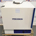 Front eye-level view of a Precision 3EG incubator resting on a wooden pallet, featuring a white exterior housing, bold Precision branding on the front door, a blue vertical side accent, and a lower control panel with a rotary dial and power switch