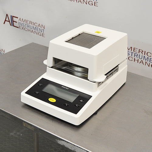Right angle product view of a Sartorius MA35 infrared moisture analyzer, featuring its white housing, top ventilation grill, and angled front control panel with a digital display