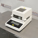 Right angle product view of a Sartorius MA35 infrared moisture analyzer, featuring its white housing, top ventilation grill, and angled front control panel with a digital display