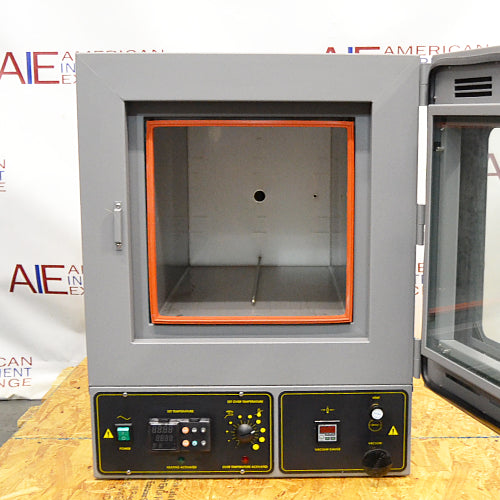 Front eye-level view of a Shel Lab 1445 vacuum oven with its glass door swung open, revealing the empty interior chamber with an orange door seal gasket and a lower control panel