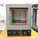 Front eye-level view of a Shel Lab 1445 vacuum oven with its glass door swung open, revealing the empty interior chamber with an orange door seal gasket and a lower control panel