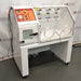 Sheldon BACTRON I anaerobic environmental chamber ka left angle view, jisme left side external panel, power cords, control module, aur rolling stand base saaf dikhai de rahe hain.   