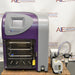 Front product view of an SP VirTis AdVantage Pro laboratory freeze dryer, featuring a purple and gray housing, digital touchscreen display, internal shelving chamber, and an attached vacuum pump system on a wooden base